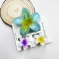 Three-piece set of plumeria hair clips in blue, purple, and white with yellow center - Mixed Color Set #5 (includes Cards)
