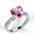 Macro shot of S925 sterling silver ring with heart shaped pink cubic zirconia stone - Ur0681a