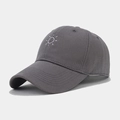 Detail shot of white sun embroidery on dark grey cotton twill baseball cap - Gray