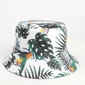 Detail view of a white sun hat featuring vibrant tropical green palm leaves and floral prints - M (56-58cm) / Tropical Leaf-White