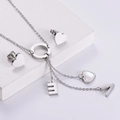 Conjunto de joyas de acero plateado con collar LOVE y pendientes corazón sobre piedra - Juego de letras / Color Acero
