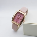 Macro view of rectangular rose gold watch with pink leather strap and diamond dial - Pink