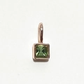 Square rose gold charm featuring a vibrant emerald green gemstone on white background - Rose Gold August