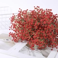 Vibrant red baby's breath artificial bouquet placed on a white book for home decoration - Red