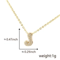 Detail view of gold letter J pendant with cubic zirconia, size 0.47 x 0.29 inch and weight 1g - Gold Letter-J