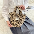 Plush leopard print tote bag with embroidered logo patch and top zipper closure - Yellow Leopard