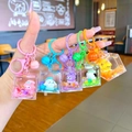 Porte-clés Sanrio en acrylique avec sable mouvant liquide et personnages de dessins animés - Style Fermoir Mousqueton / Style de cube de figurines de dessin animé (Mélange aléatoire)
