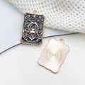 Strength Tarot card pendant in black and gold metal alloy for necklaces and jewelry - Lion Head (Strength)