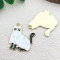 Halloween black cat alloy pendant with white enamel finish and gold star moon patterns - Sitting Cat (24x28mm)