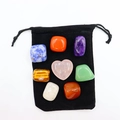 Polished seven-color rainbow crystal stones arranged on a black velvet storage pouch - Heart-shaped Red Stone Style