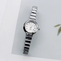 Close-up of a silver quartz watch featuring a Roman numeral dial and rhinestone bezel - Silver White