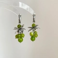 Silver flower C-shaped earrings with green crystal grape tassels and polished finish - Silver Post Grape Design / Green