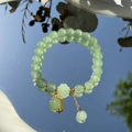 Exquisite pearl and sea blue bead bracelet with green jade charms on a reflective surface - S048-green Dragon Pearl Donglin Jade Beaded Bracelet #sz342