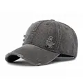 Vintage dark gray washed denim baseball cap with distressed ripped holes and retro street style - Gray