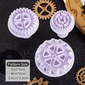 Set of 3 purple gear-shaped cookie cutters for fondant stamps in various sizes - 3D Gear Shape Mold Set