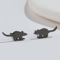 Macro shot of minimalist matte black stainless steel mouse silhouette stud earrings - Little Mouse / Black