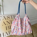 Floral canvas tote bag featuring orange tulips and blue braided handles in style - Cotton Tulip