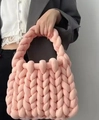 Handmade chunky knit handbag in soft pink Iceland yarn featuring a woven handle design - Blood Red (Finished)