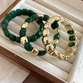 Detailed close-up of three chunky geometric stretch bracelets in gold and peacock green resin - 13# Beaded Bracelet (HB4515)
