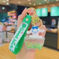 Cute green Cinnamoroll acrylic liquid quicksand keychain with Good Luck wristlet - Bubble Bath Quicksand - Blue Puppy