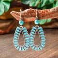 Detailed close-up of Bohemian teardrop earrings hanging on a natural wooden branch - Teardrop Hollow Retro Silver (HQEF-0707)