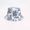 Close-up of the New York city skyline print on a white reversible cotton bucket hat - New York Letters White