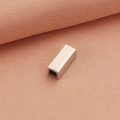 Silver hollow rectangular prism titanium steel spacer bead on soft pink fabric - 5*12MM / Steel