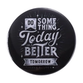 Round tinplate badge featuring white inspirational text on a black matte finish background - DO SOMETHING Today