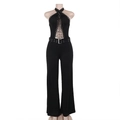 Eng anliegender schwarzer Neckholder-Jumpsuit mit Schnürung und weitem Beinschnitt - L / Schwarz