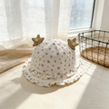 Dettaglio cappello da sole per neonati color crema con stampa margherite e stelle - 46-48cm (5-20 mesi) / Cachi