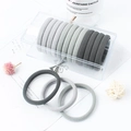 Elastic fabric hair ties in gray gradient shades neatly organized in a clear plastic box - 15 Pcs Light 3-Color Mix