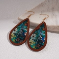 Detailed view of teardrop wood earrings with colorful floral inlay on stone background - Ear Hook-Style 1 (Colorful Floral)
