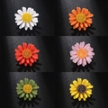 Enamel daisy flower brooch pins in six vibrant colors with rhinestones and resin petals - 6-Piece Set (Mixed Colors)