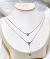 Detail of silver double-layer snake chain necklace with geometric square pendants - Silver