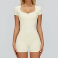 Slim fit cream athletic romper with white contrast trim and U-neck for yoga training - Apricot Yellow