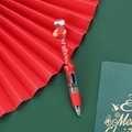 Christmas quicksand ballpoint pen with red stocking top and festive glitter filling - Series 10 - Red Sock