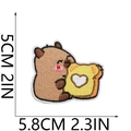Detailed view of Capybara embroidery patch with toast including 5.8cm x 5.0cm dimensions - Holding Toast