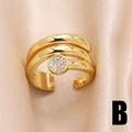 Unregelmäßiger vergoldeter mehrlagiger offener Ring mit funkelndem Zirkonia auf Seide - Runder Pavé-Stil (B)