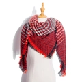 Red and black plaid knit triangle scarf with tassels displayed on a mannequin - Crimson Plaid