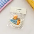 Blaues Haargummi und Clip-Set mit niedlichen 3D-Bärenmotiven und Blumendetails - Gelber Bär C (Im Beutel)