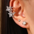 Set of three silver star zircon ear cuffs and studs worn for a sophisticated minimalist look - Star Earring Set (White K)