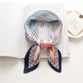Pleated square scarf featuring light blue and navy color-blocking with geometric patterns - Blue White Plaid Mix