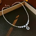 Collier de perles plaqué or 18k avec pendentif en pierre bleue en forme de poire et perles - Collier Verre Zircon Perle Argent Fragment