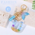 Ocean style resin letter U keychain with shells and blue tassel accessory - Letter U