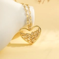 Collana a cuore placcata oro con zirconi baguette su supporto in ceramica minimalista - Cuore Traforato con Zirconia Taglio Baguette