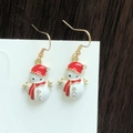 Detailed close-up of a Christmas snowman earring with red enamel and sparkling rhinestones - White Enamel Snowman with Rhinestone