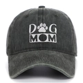 Detail view of Dog Mom embroidery and paw print on washed cotton baseball cap - Army Green