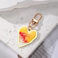 Bohemian hartvormige sleutelhanger met geel marmeren emaille in een goudkleurig metalen frame - Rood Oranje