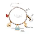 Pulsera oceánica de acero inoxidable con colgantes de sol, concha y circón - Bicolor (E211)