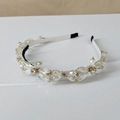 Close-up of handmade floral crystal headband with luxury rhinestones and woven white band - Style SJ004 / Large Crystal Transparent